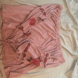 Off the shoulder shirt.